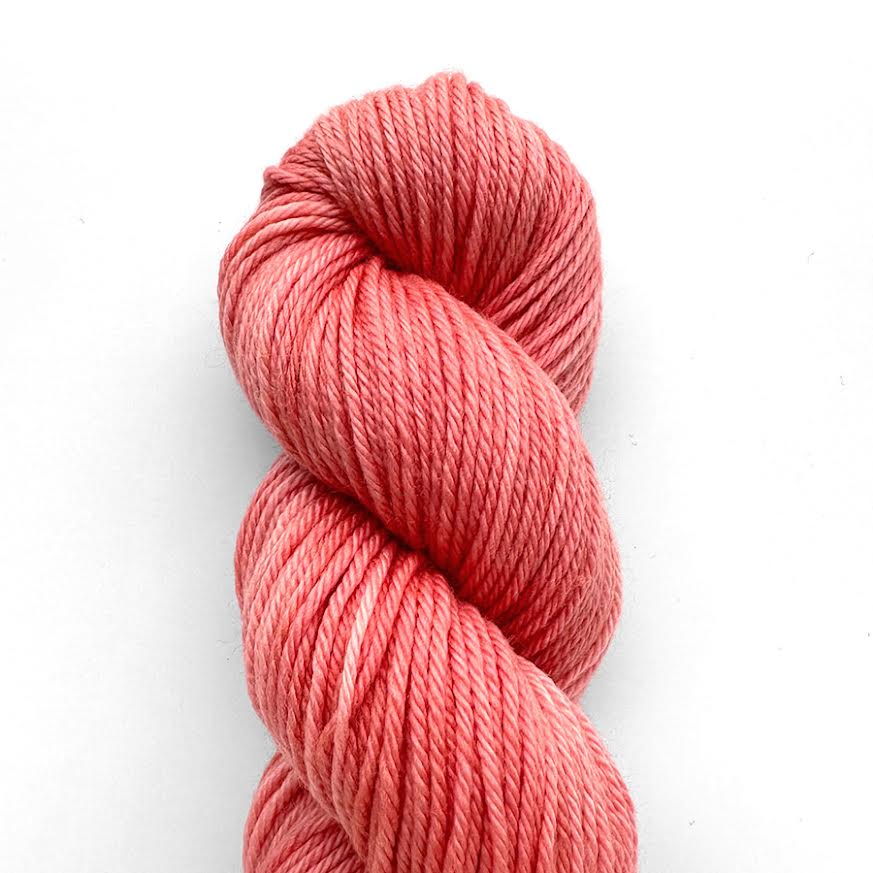 Loop Flora in pink lemonade, a medium, pinkish orange shade.