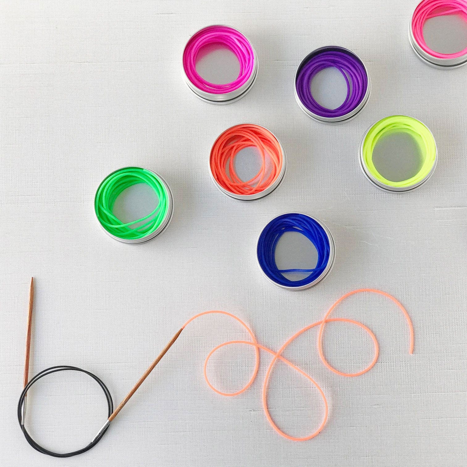 Colorful barber cords and knitting needles