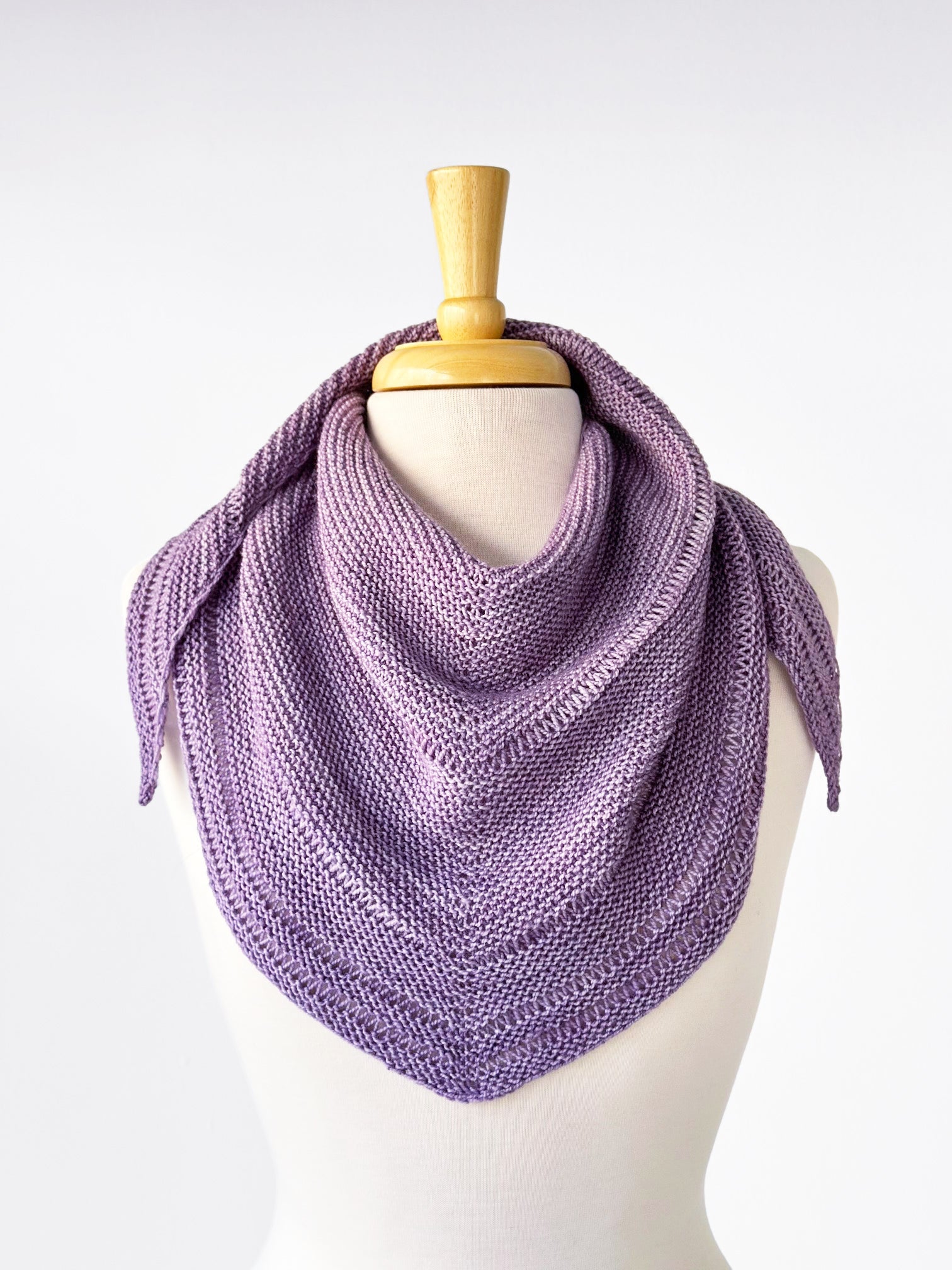 Spring Thaw Shawlette draped on a dress form.