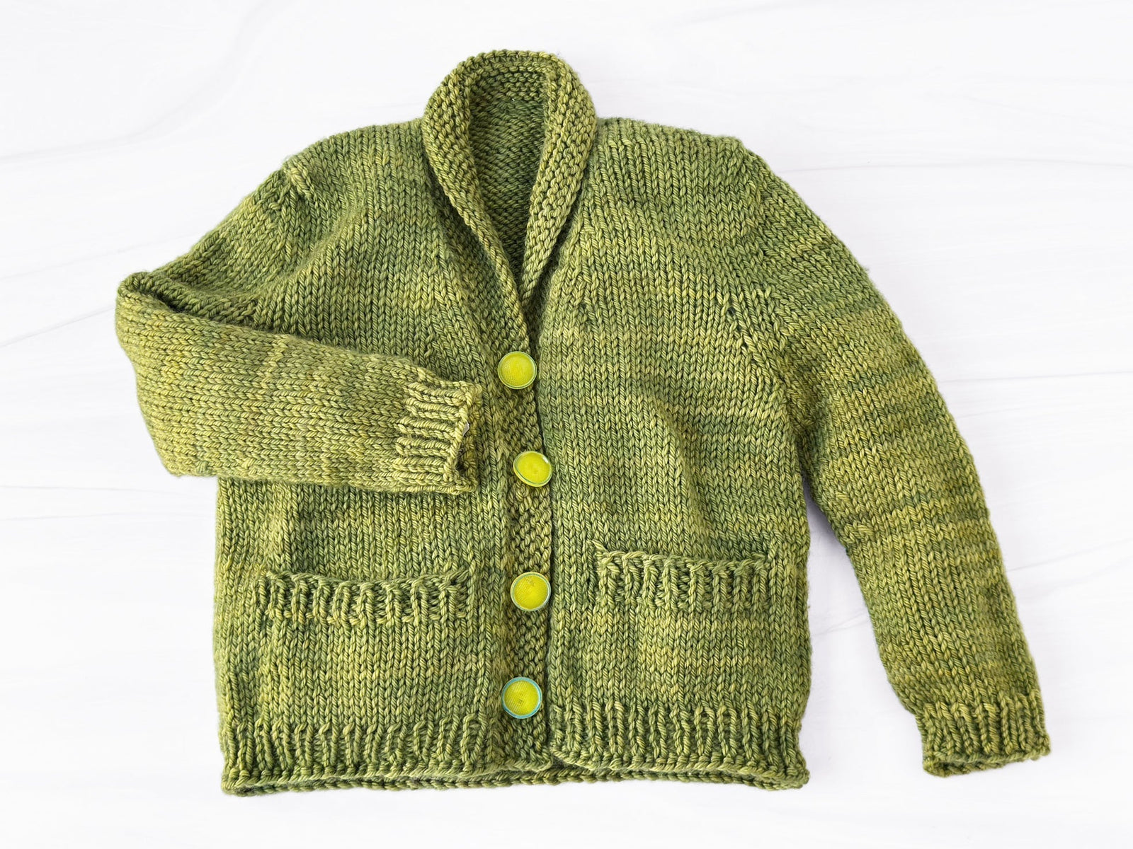 Baby Coco cardigan in Flora yarn. 