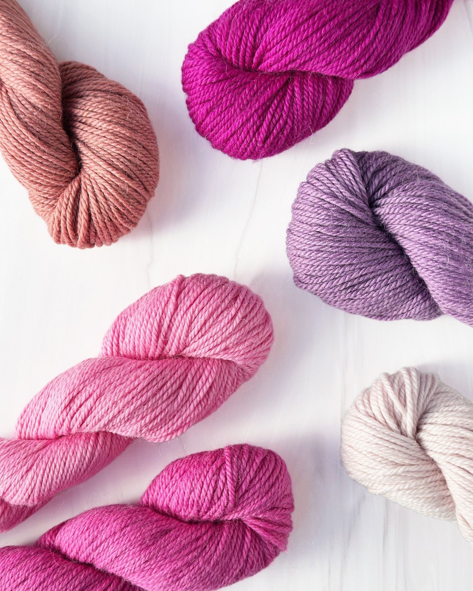 A collection of pink alpaca yarn 