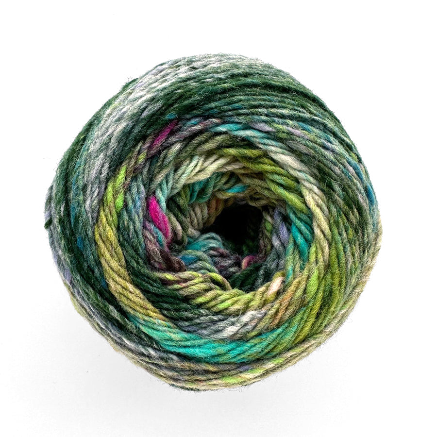 Noro Ito Ninohe yarn ball in green, blue, and yellow
