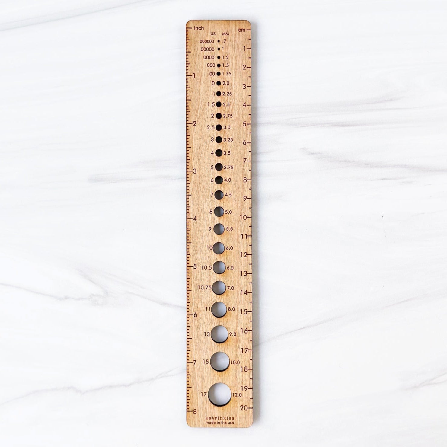 katrinkles ruler featuring both English and metric ruler measurements and a needle gauge 