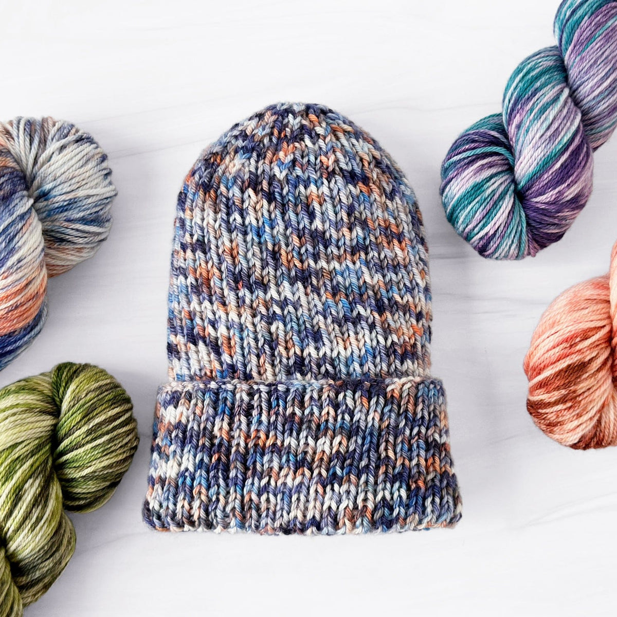 Ribbed knit hat with colorful yarn