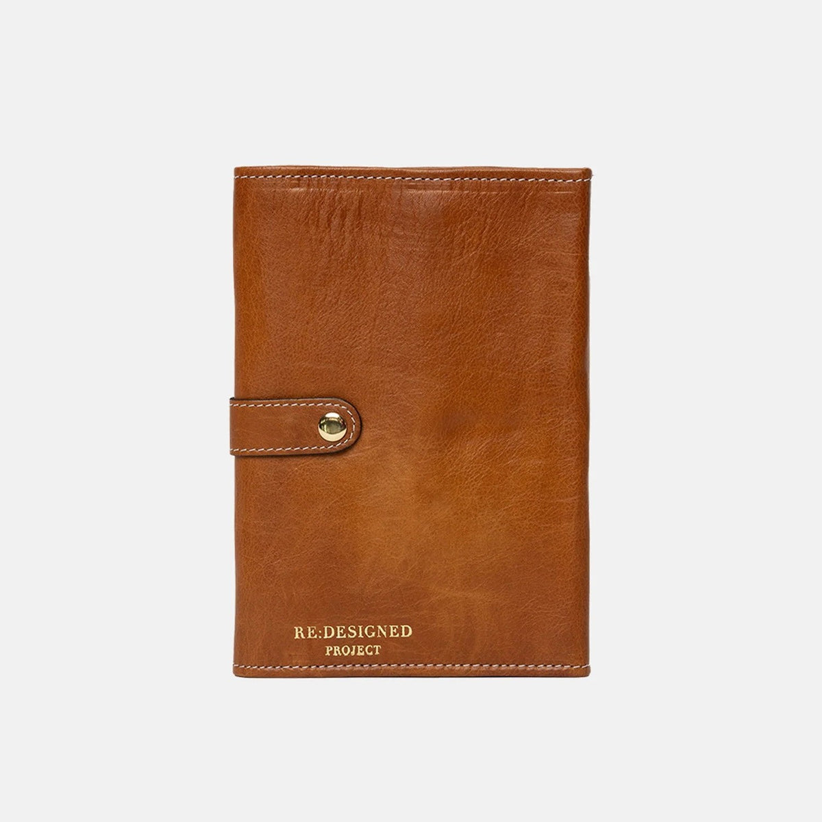 Redesigned Project 7 needle case in burned gold
