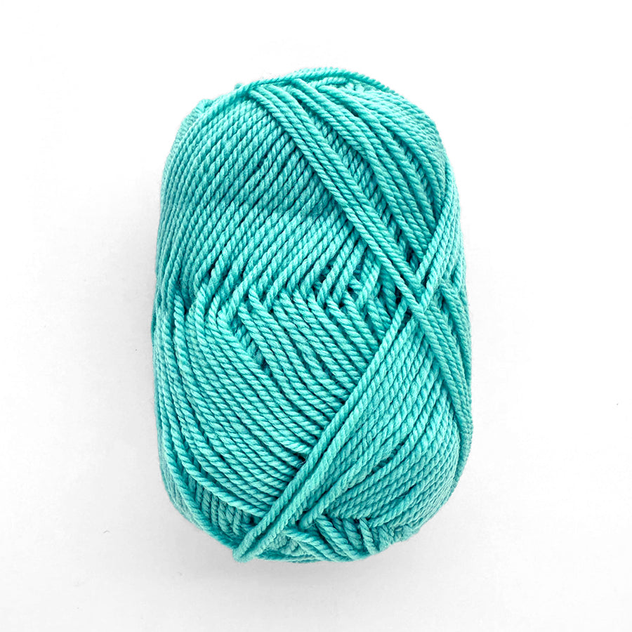 Light turquoise skein of yarn on a white background