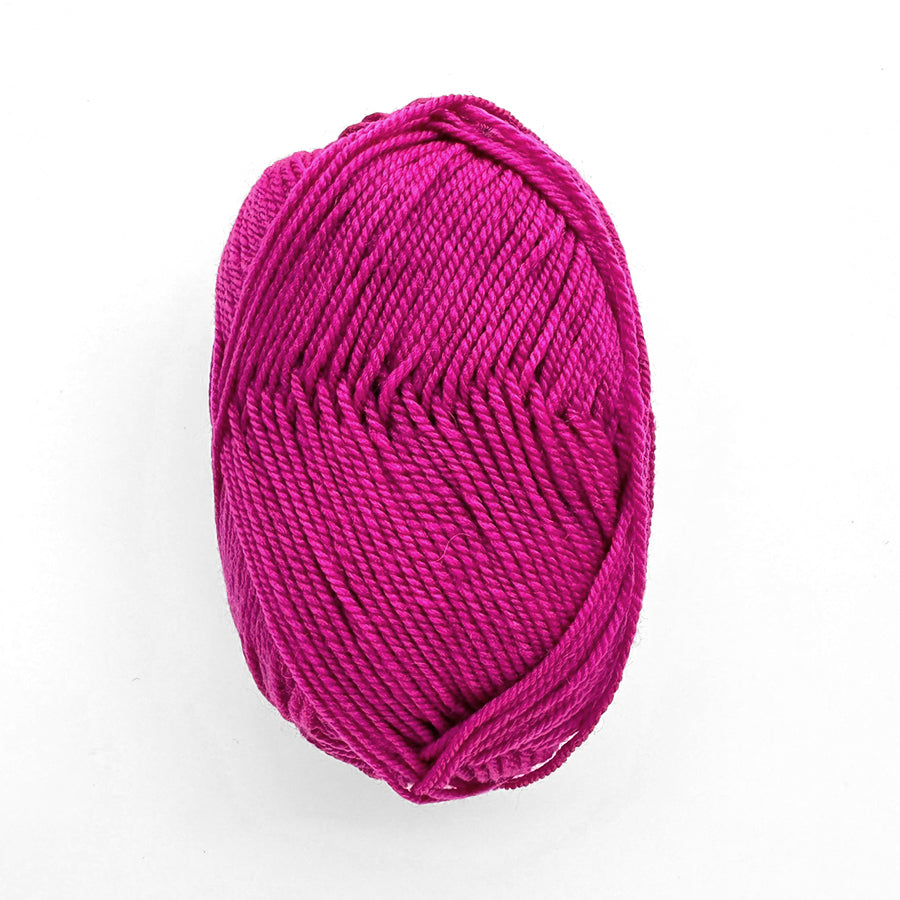 fuchsia ball of yarn on a white background