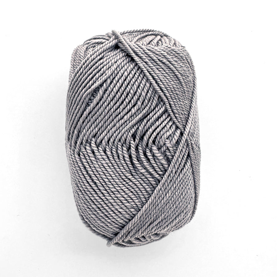 Gray skein of yarn on a white background