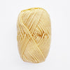 Pale yellow yarn ball on a white background