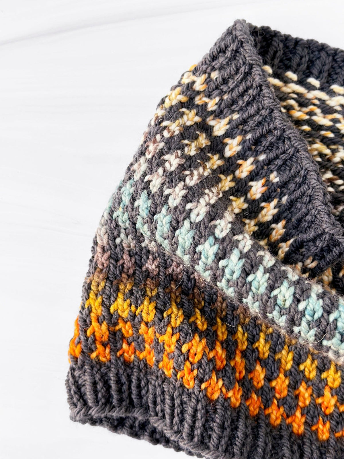 Houndstooth knit cowl flat lay