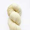 Lemon-colored yarn skein, loop-sprig