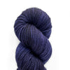Loop Sprig Lupine yarn skein, blue and purple hues.