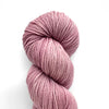 Mauve yarn skein in a loop.