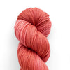 Papaya-colored loop of yarn
