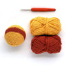 Crochet sphere with yarn and hook
